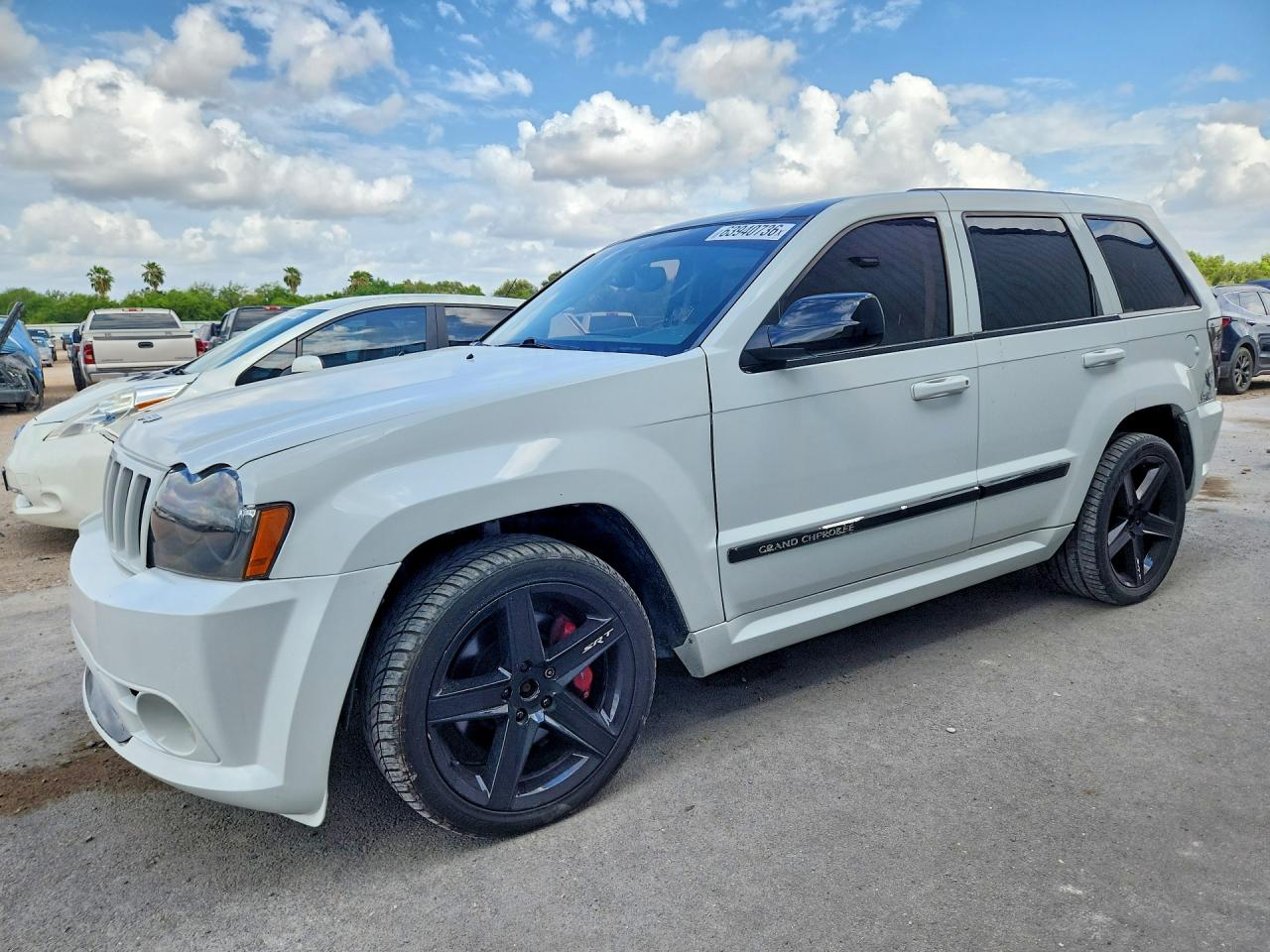 2007 Jeep Grand Cherokee SRT-8, VIN 1J8HR78387C519489 — Мелкие вмятины и царапины