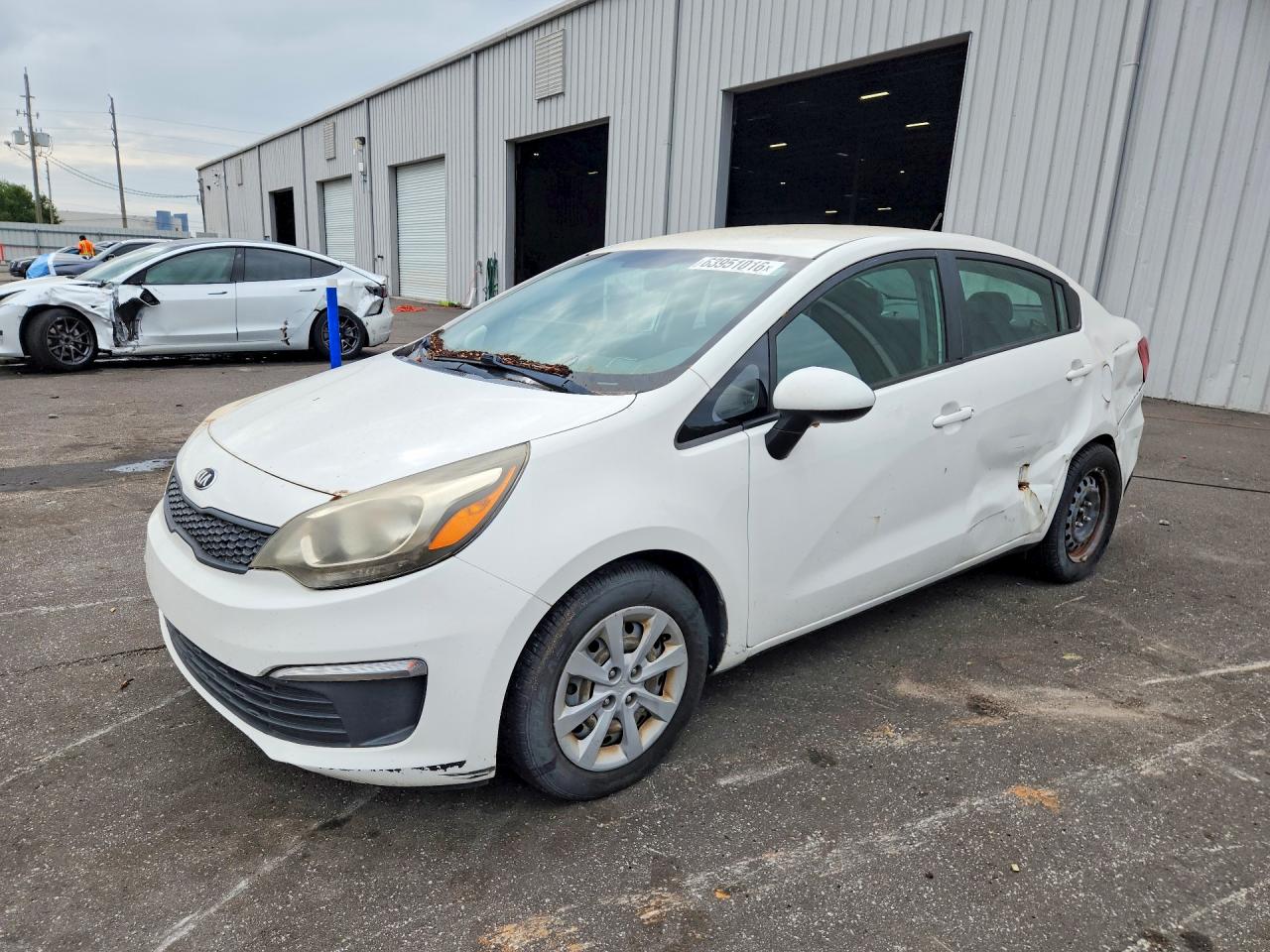 2016 Kia Rio LX, VIN KNADM4A35G6548702 — Side
