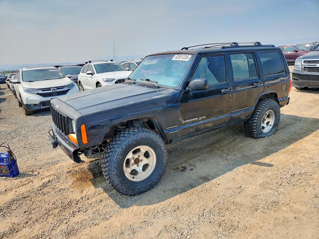 1999 Jeep Cherokee Sport, VIN 1J4FF68SXXL669333 — All over