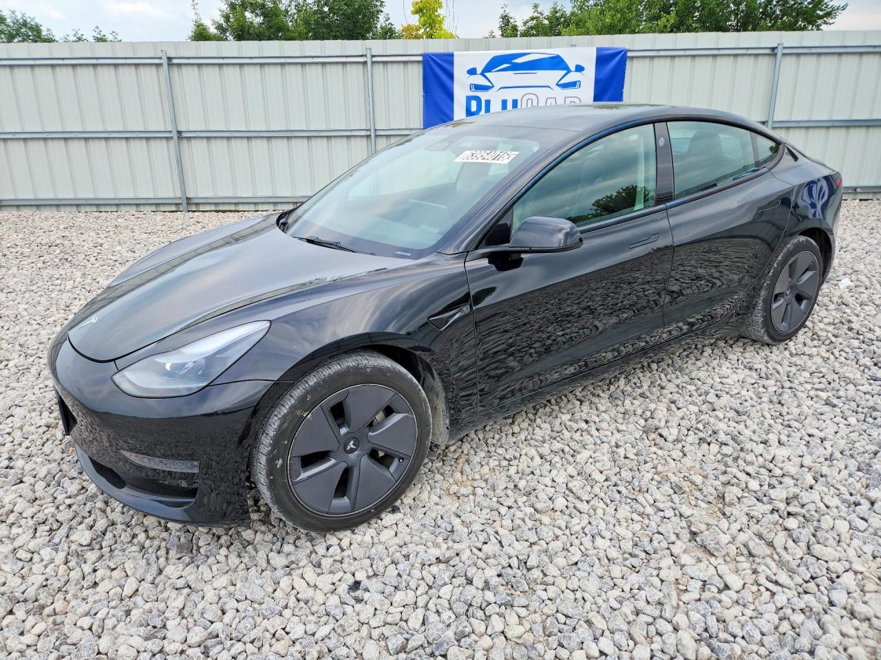 2022 Tesla Model 3, VIN 5YJ3E1EA4NF288846 — Side