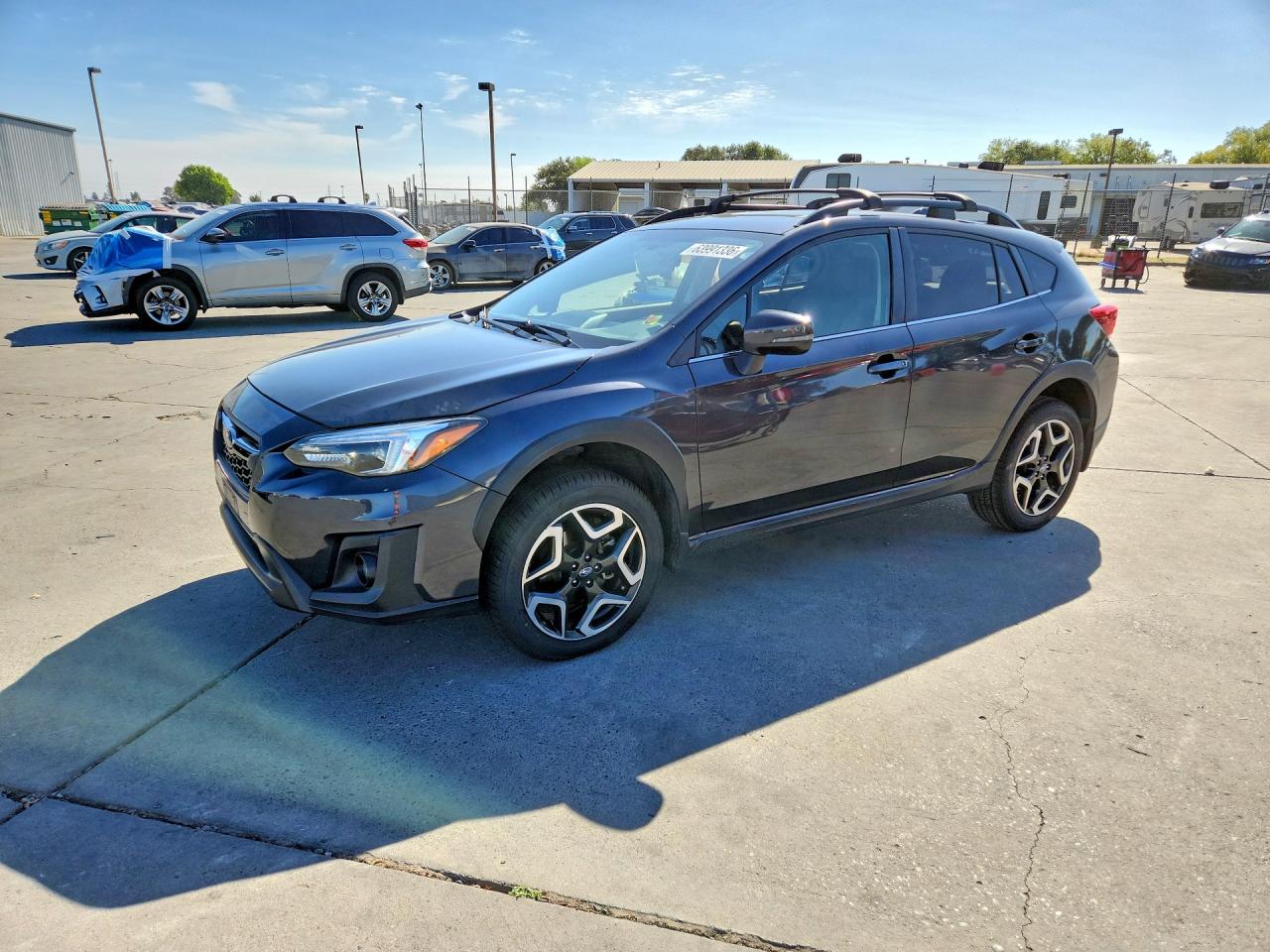2019 Subaru Crosstrek Limited, VIN JF2GTANC4KH220505 — Side