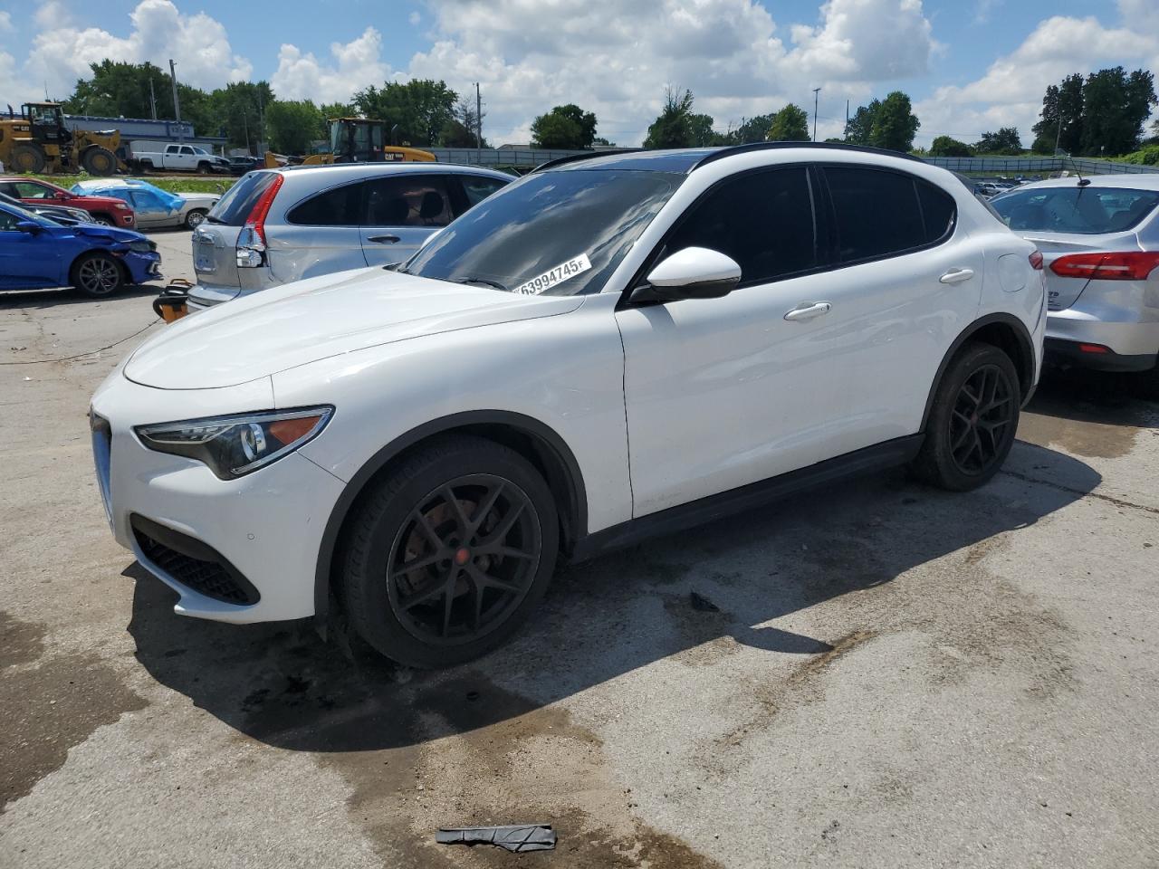 2018 Alfa Romeo Stelvio Ti Sport, VIN ZASFAKNNXJ7B99355 — Hail