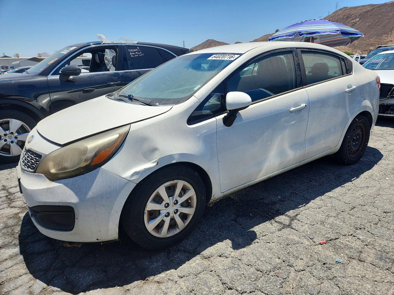 2015 Kia Rio LX, VIN KNADM4A3XF6433818 — Front end