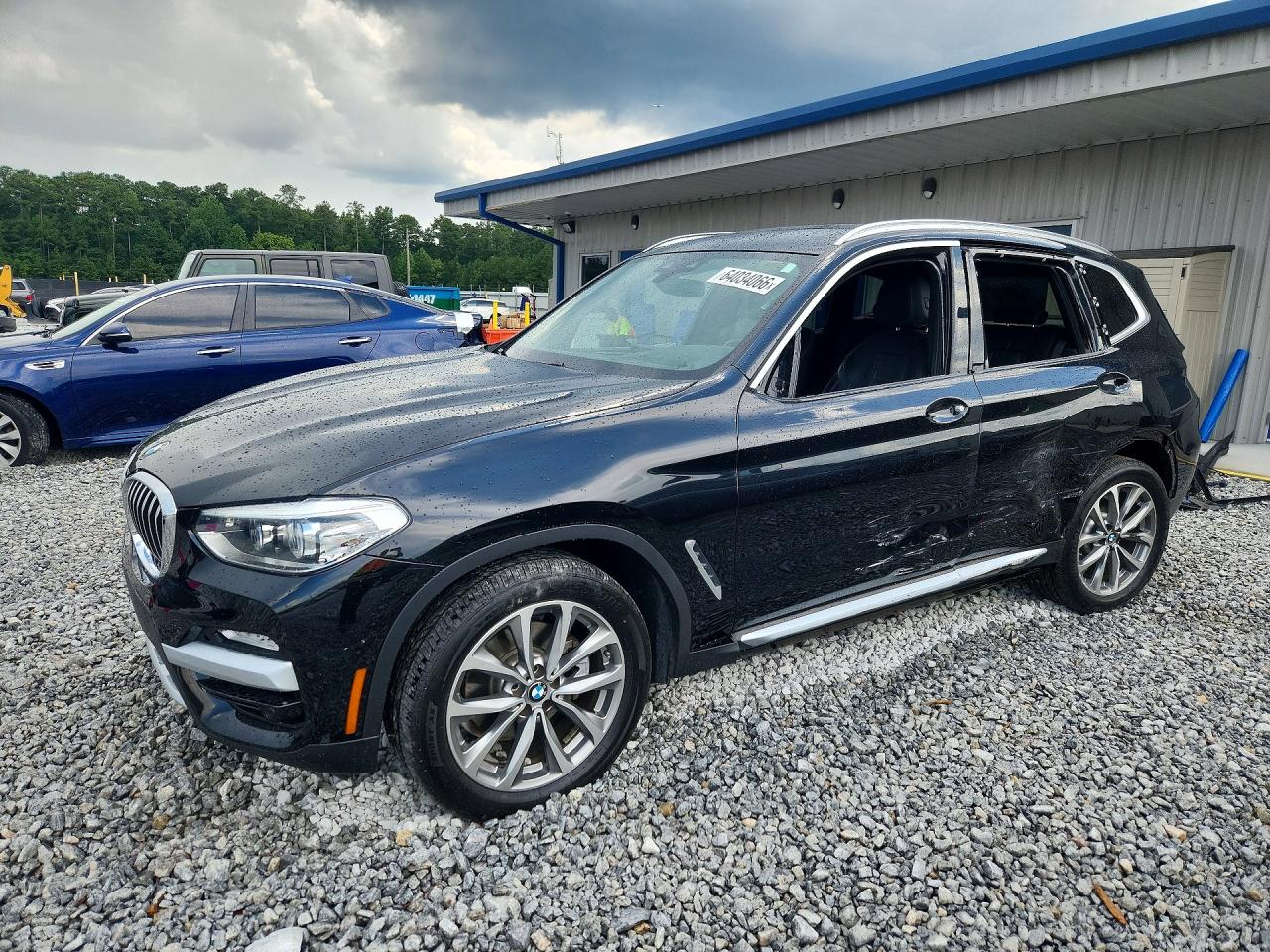 2019 BMW X3 xDrive30i, VIN 5UXTR9C57KLE20209 — Бок