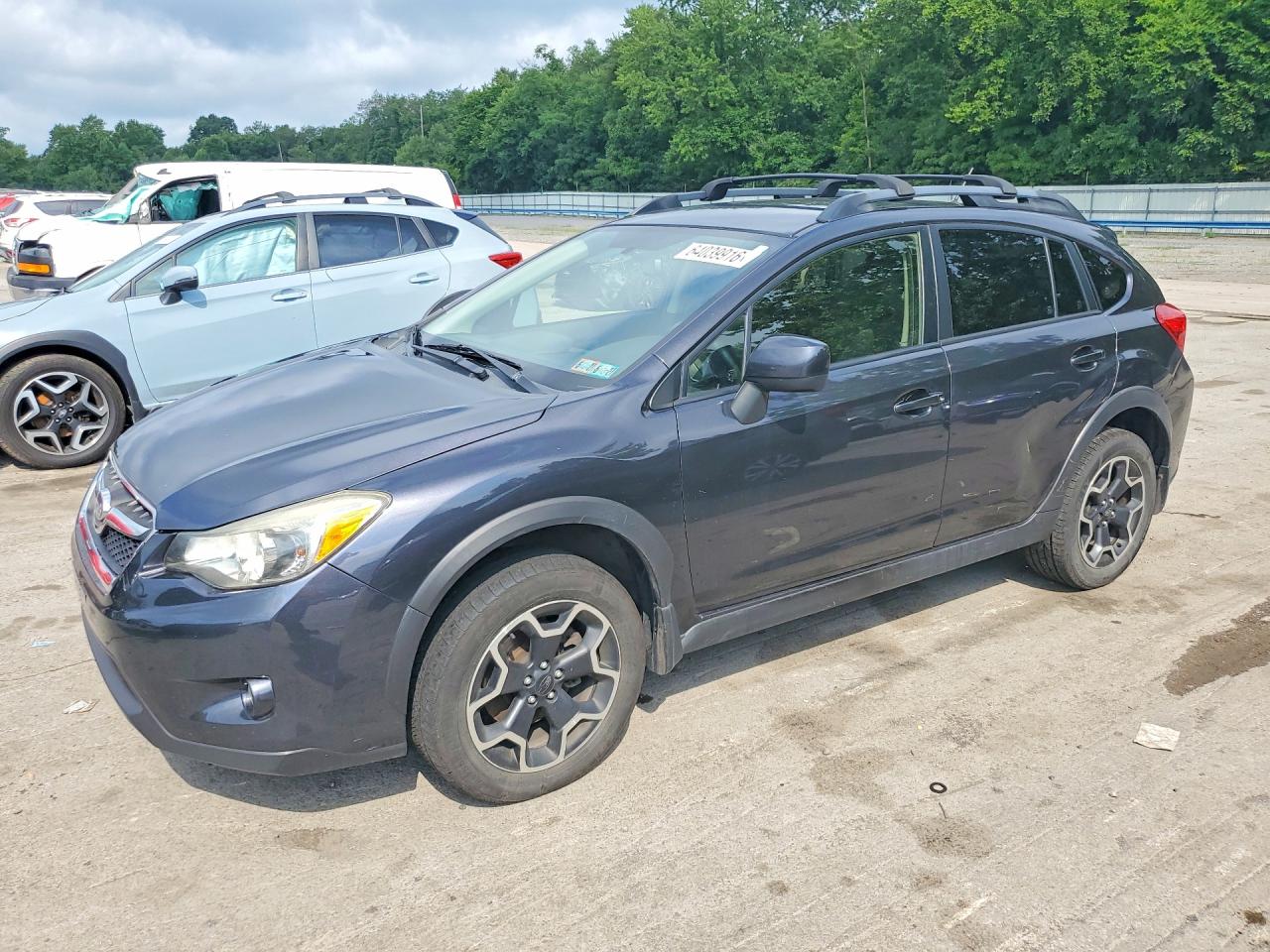 2014 Subaru Crosstrek Premium, VIN JF2GPACC0E8233568 — Side