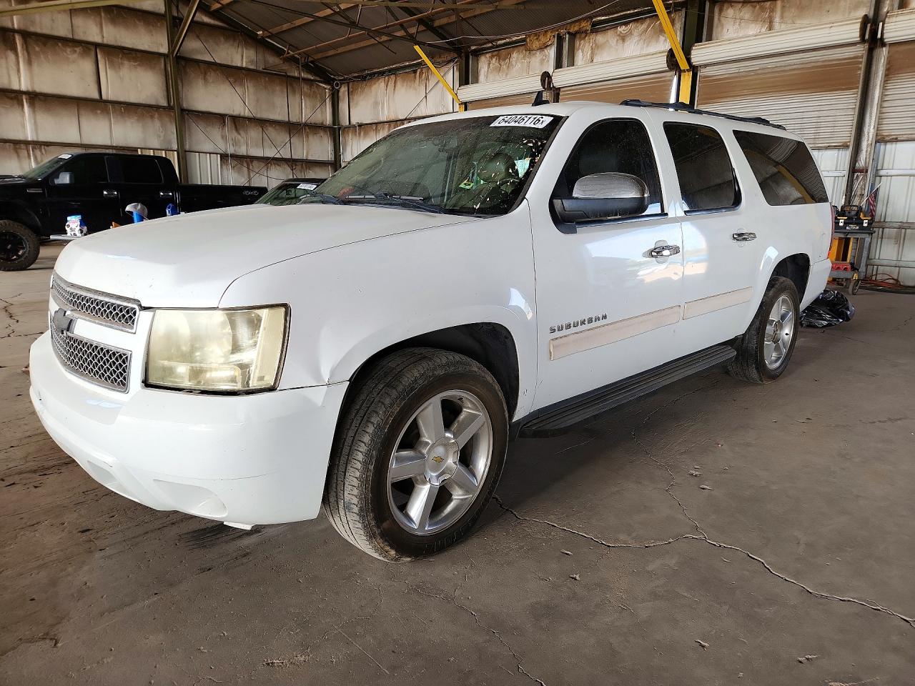 2011 Chevrolet Suburban LT, VIN 1GNSCJE0XBR237874 — Rear end