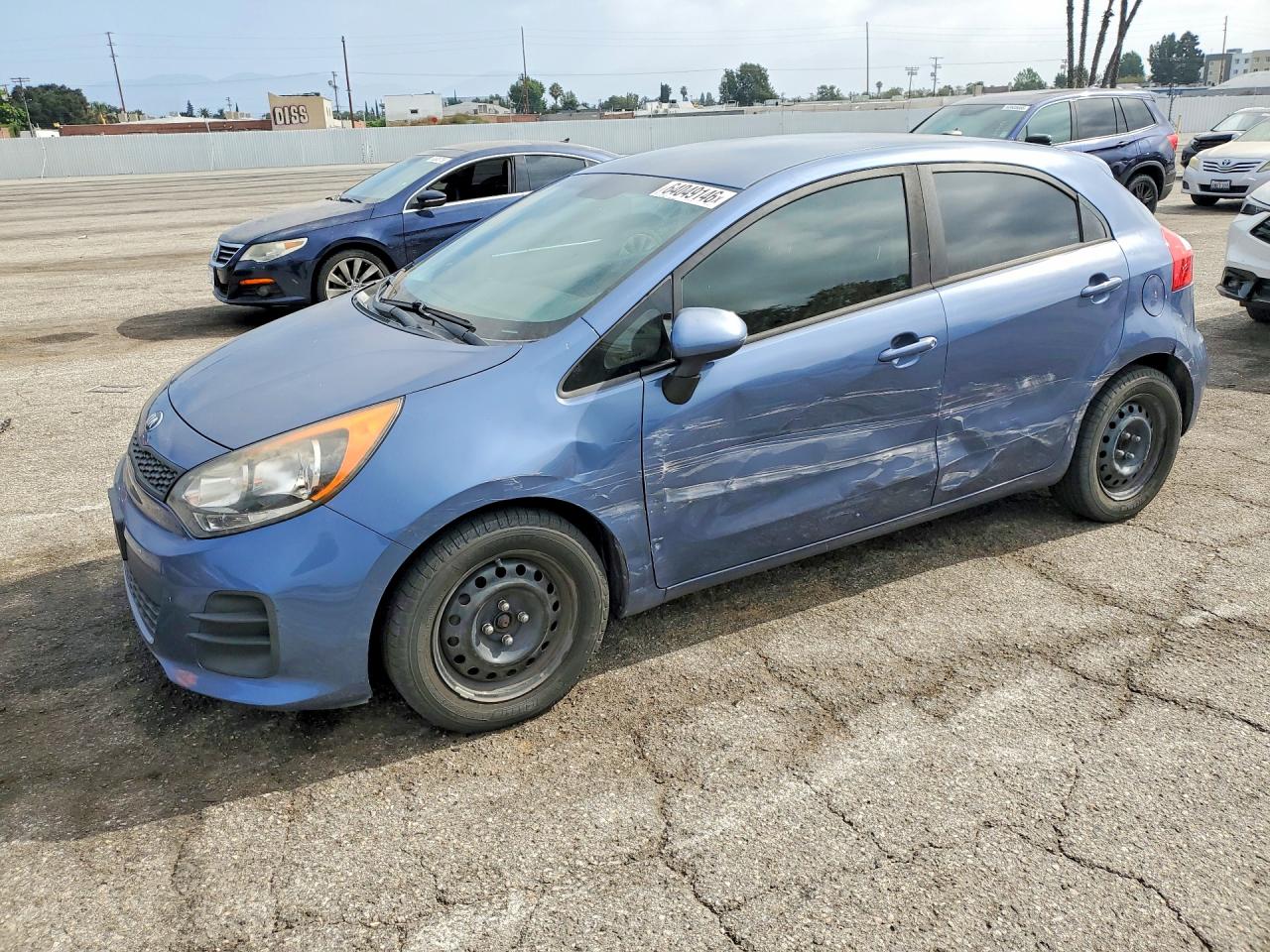 2016 Kia Rio LX, VIN KNADM5A33G6678354 — Бок