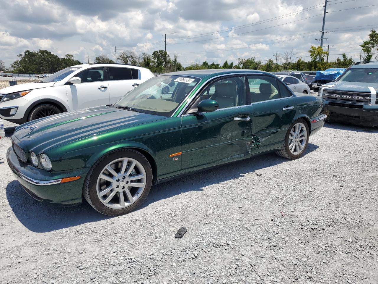 2004 Jaguar XJ R, VIN SAJWA73BX4TG16956 — Side