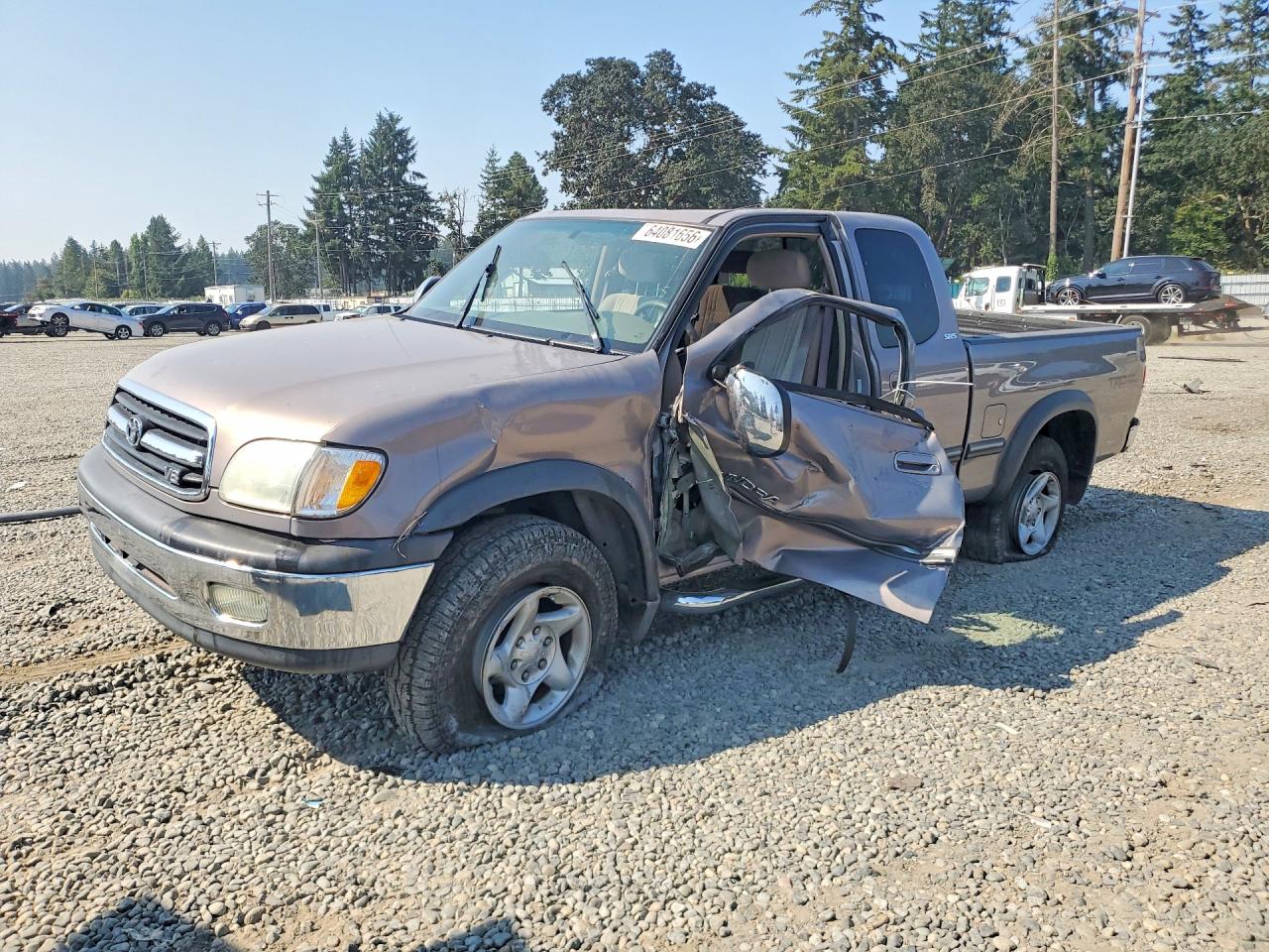 2002 Toyota Tundra SR5, VIN 5TBBT44112S257039 — Side