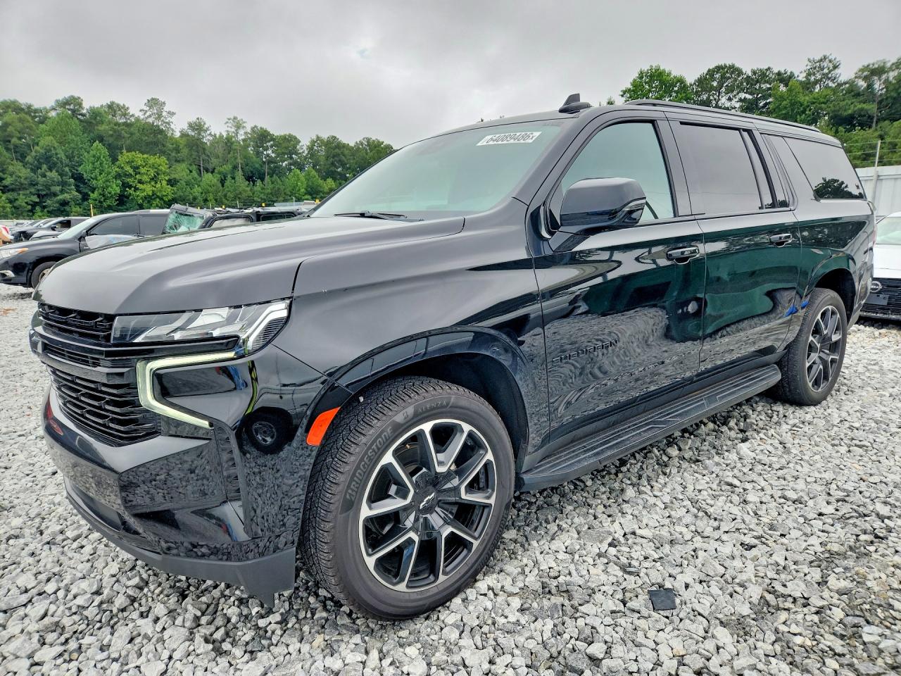 2023 Chevrolet Suburban RST, VIN 1GNSKEKD1PR279715 — Мелкие вмятины и царапины