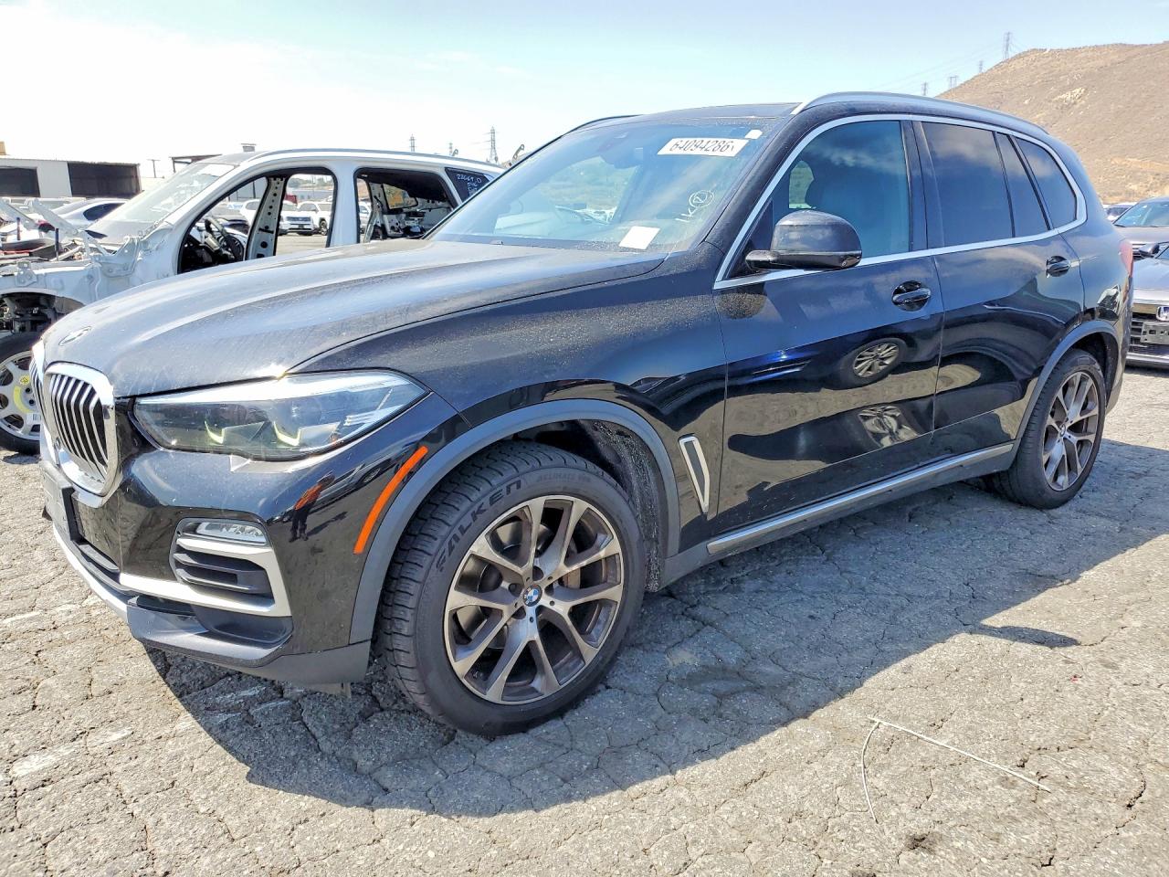 2019 BMW X5 xDrive40i, VIN 5UXCR6C54KLL07071 — Мелкие вмятины и царапины