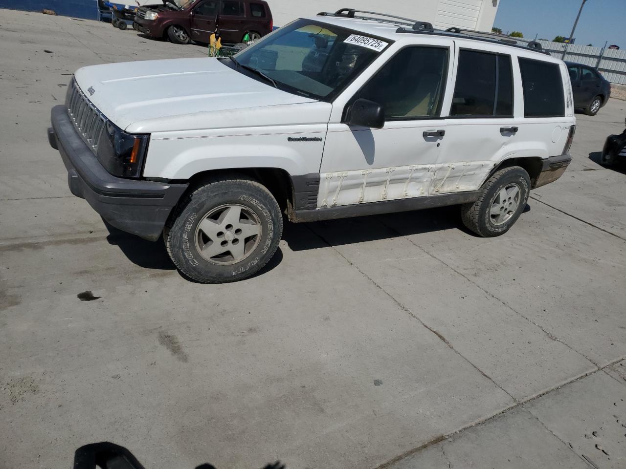 1994 Jeep Grand Cherokee Laredo, VIN 1J4GZ58S6RC310800 — Side