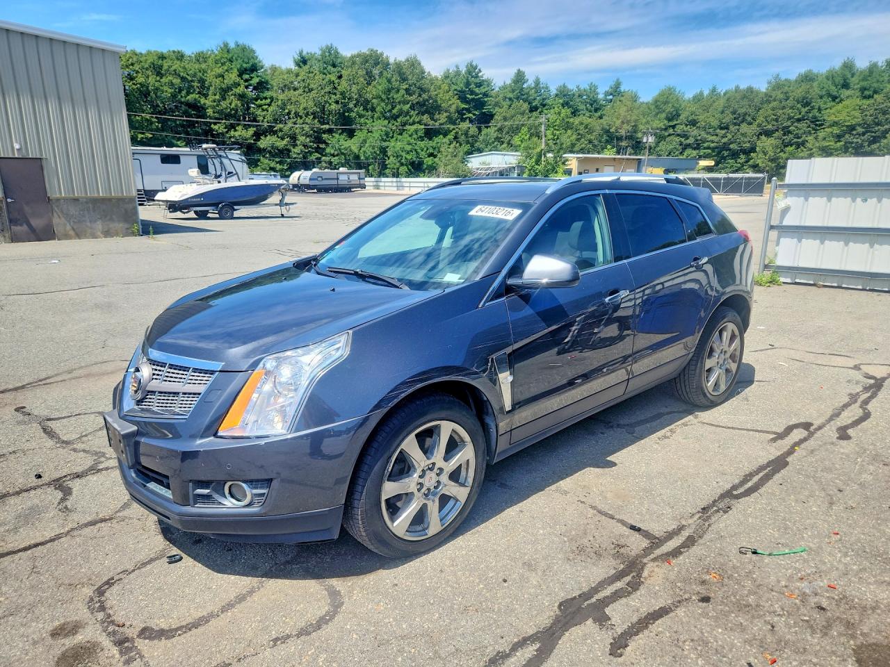 2012 Cadillac SRX Premium Collection, VIN 3GYFNFE34CS566414 — Бок