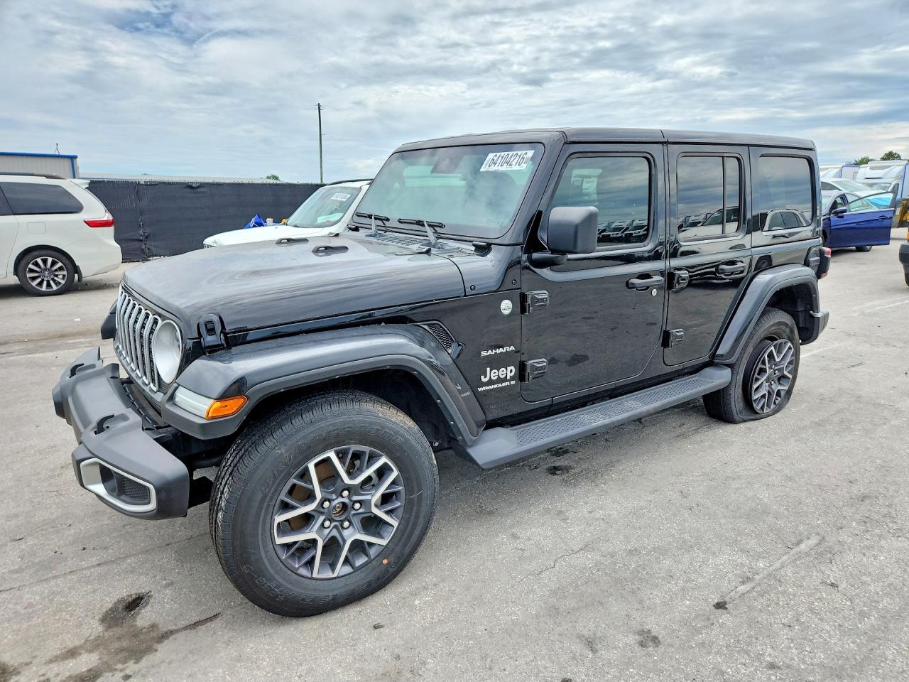 2024 Jeep Wrangler Sahara, VIN 1C4PJXEN3RW140143 — Minor dents and scratches