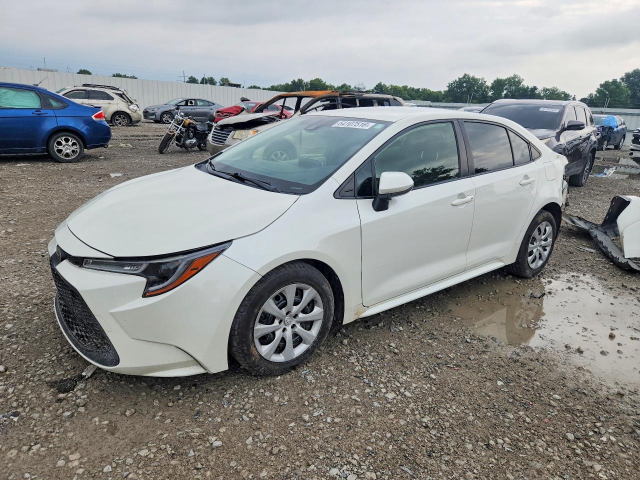 2021 Toyota Corolla LE, VIN JTDEPMAE2MJ169147 — Side