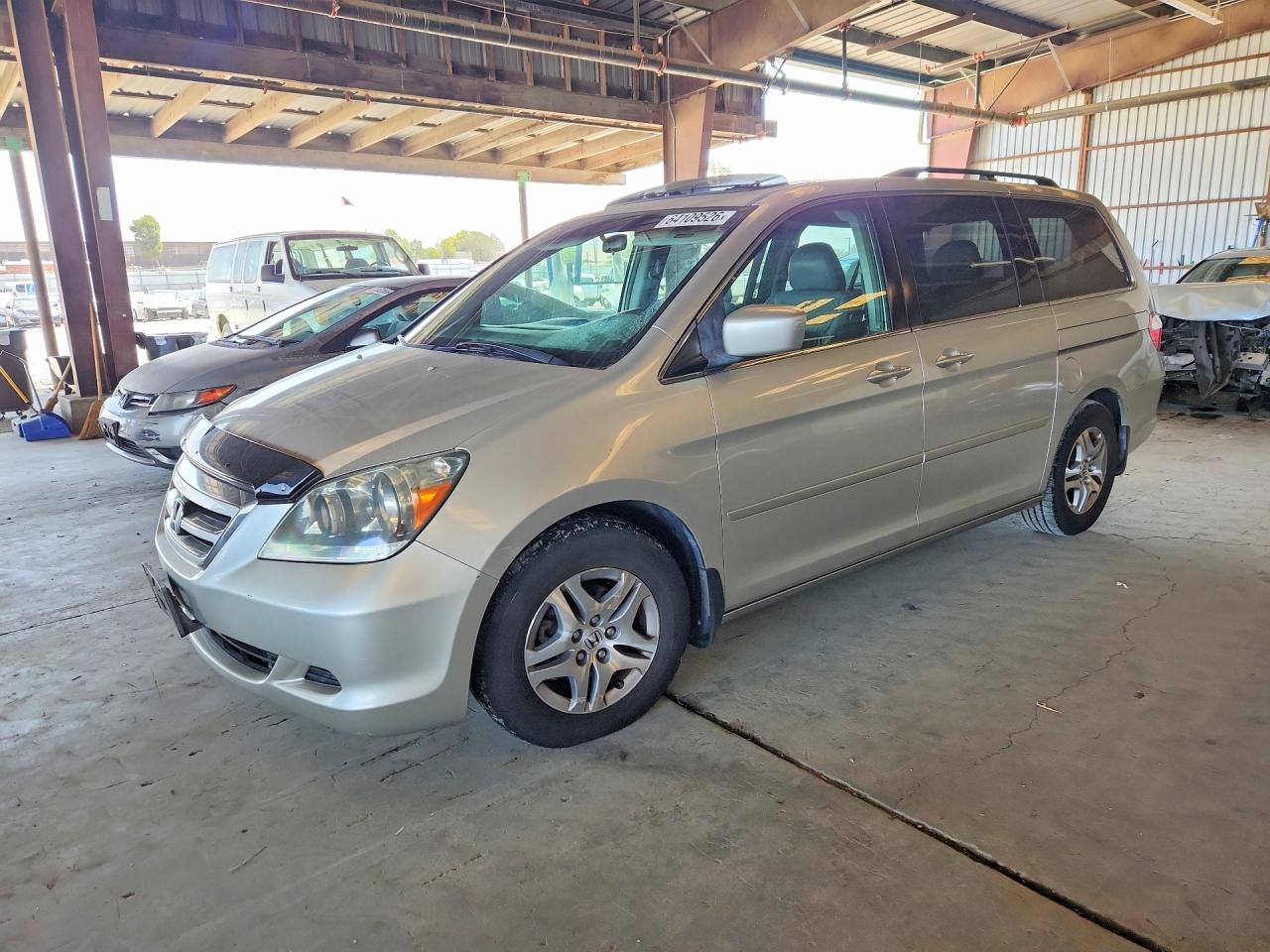 2005 Honda Odyssey EX-L, VIN 5FNRL38625B027847 — Side