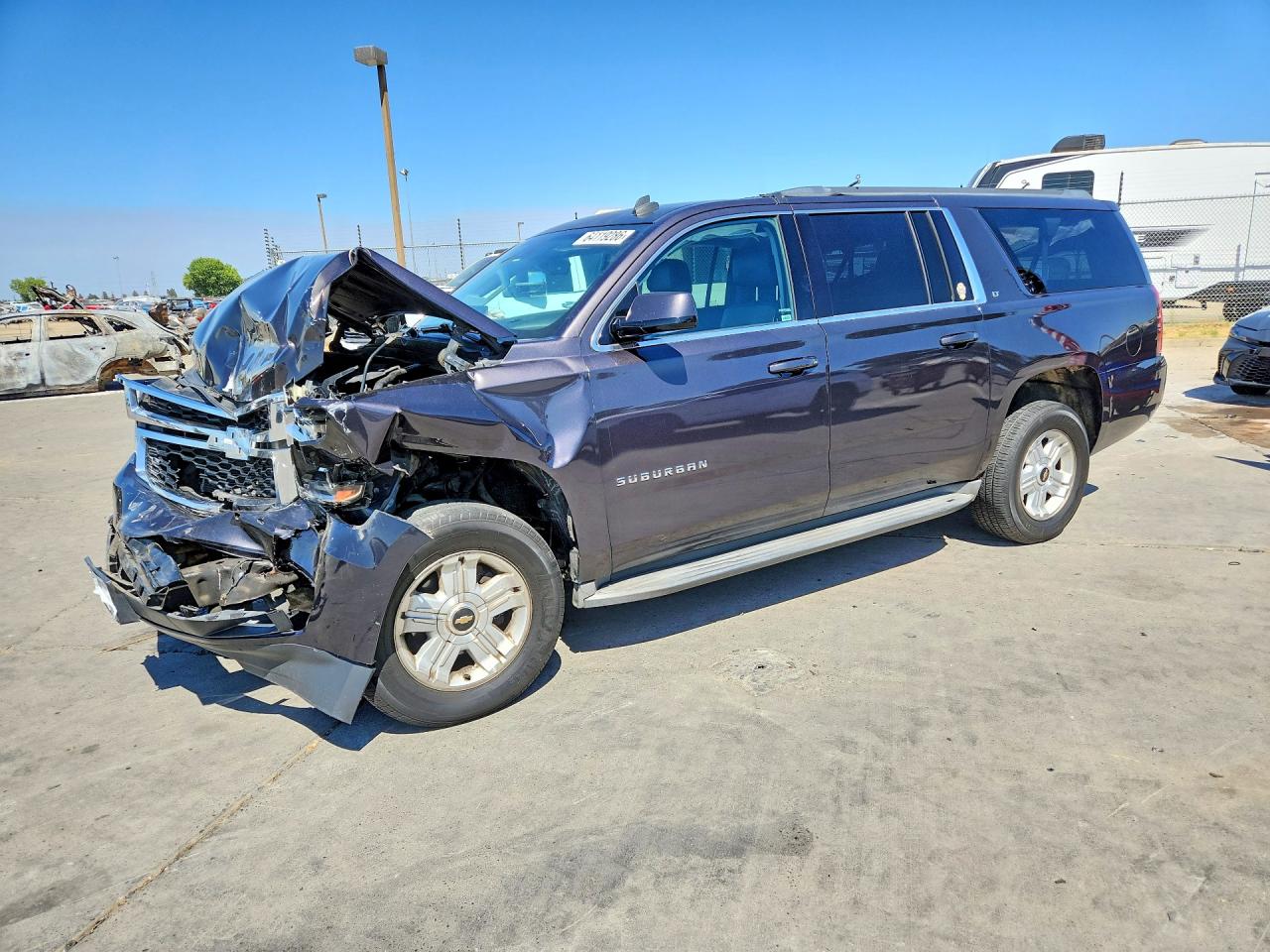 2015 Chevrolet Suburban LT, VIN 1GNSCJKC0FR227066 — Front end