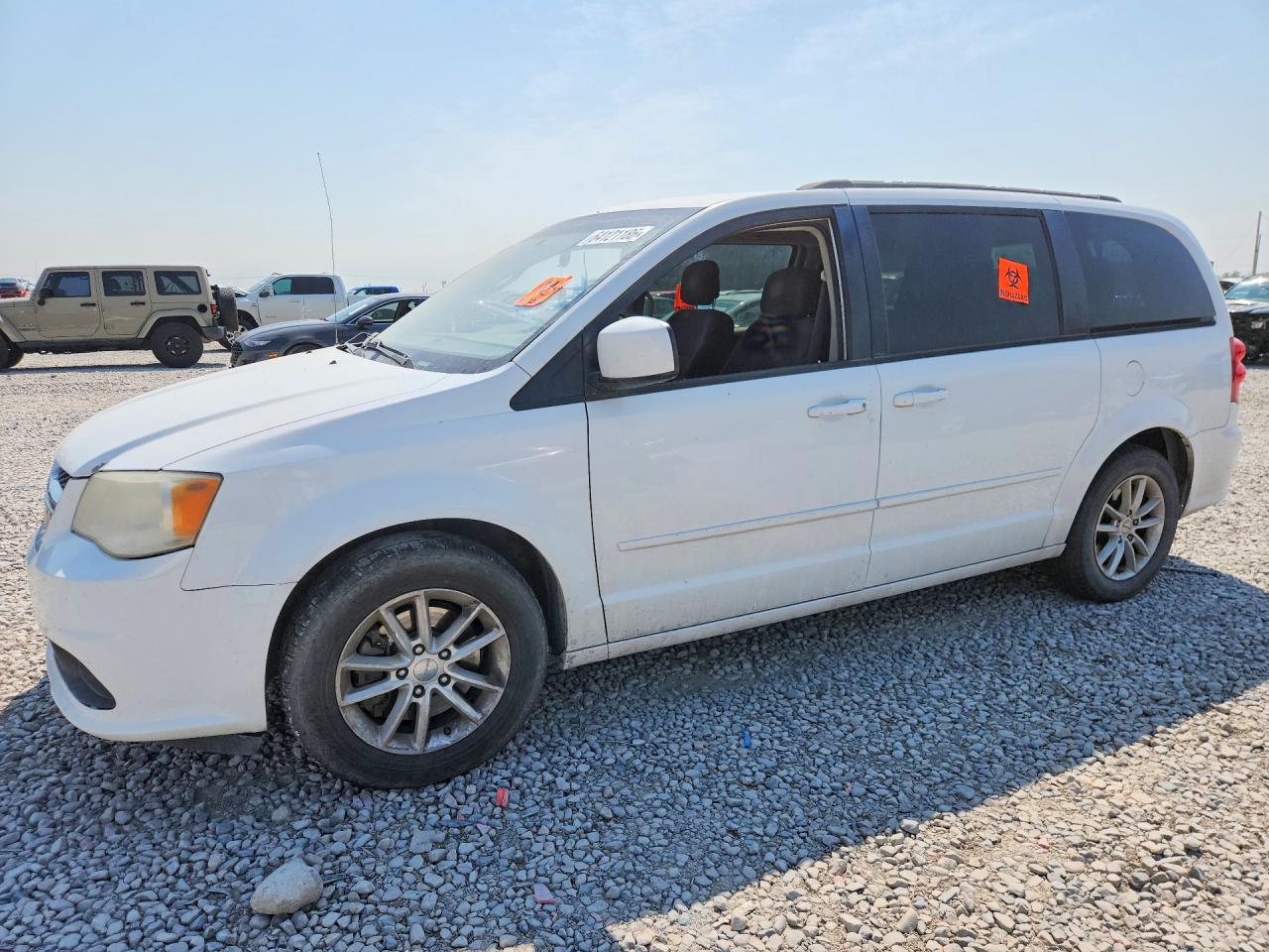 2014 Dodge Grand Caravan SXT, VIN 2C4RDGCGXER341643 — Biohazard / chemical