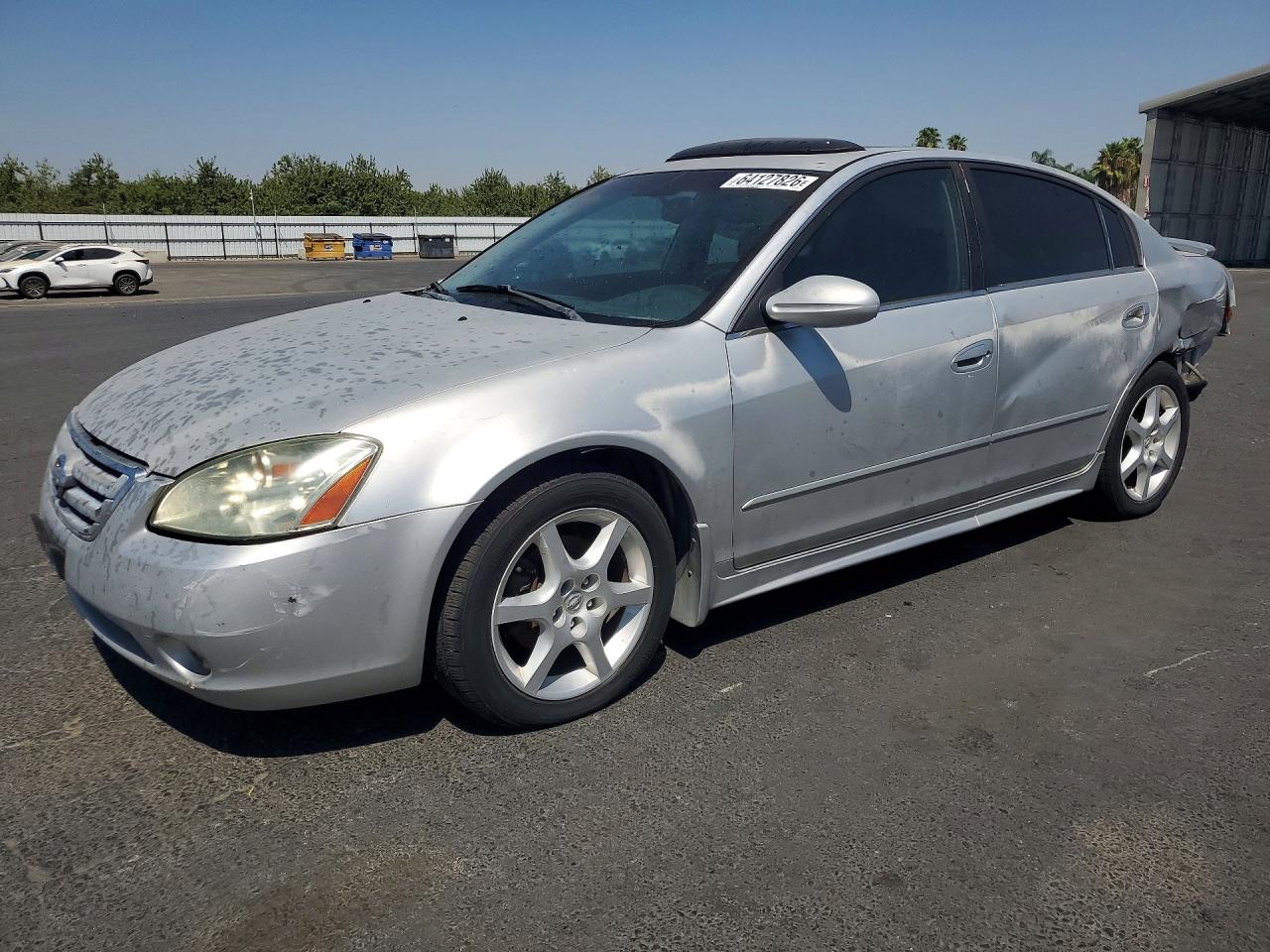 2002 Nissan Altima SE, VIN 1N4BL11E22C189760 — Rear end