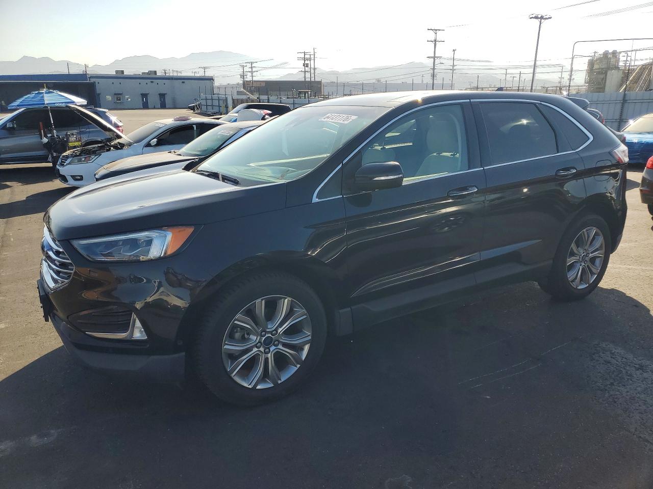 2019 Ford Edge Titanium, VIN 2FMPK3K98KBC02698 — Minor dents and scratches