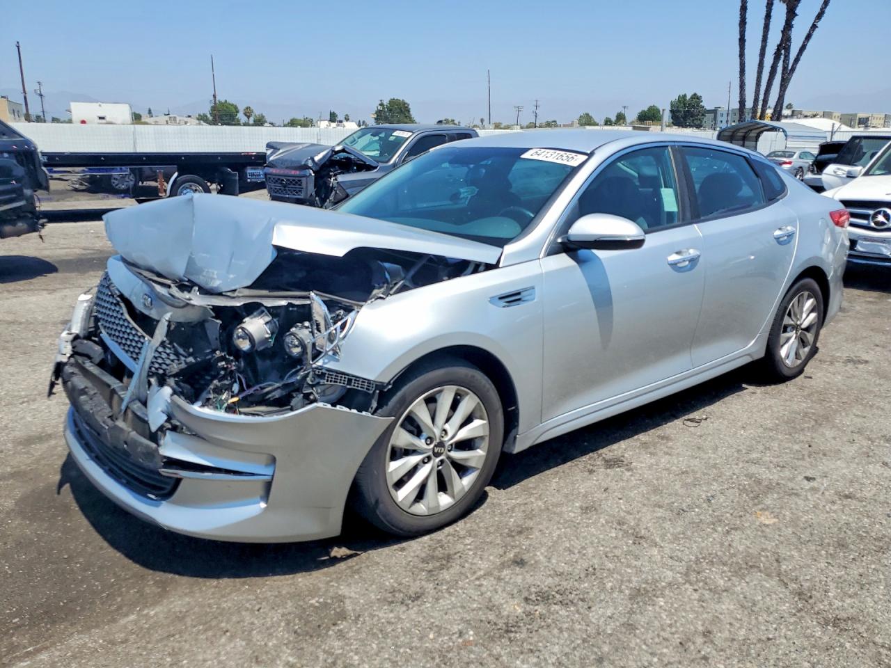 2016 Kia Optima EX, VIN 5XXGU4L37GG031299 — Front end