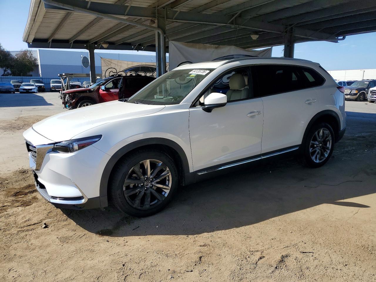 2016 Mazda CX-9 Grand Touring, VIN JM3TCADY0G0108632 — Бок