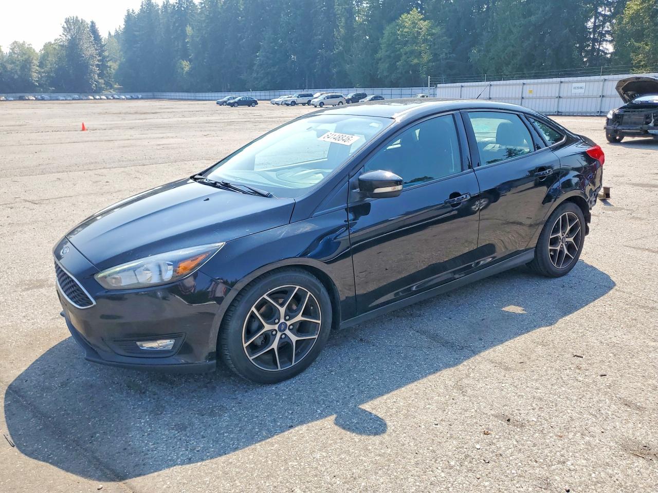 2017 Ford Focus SEL, VIN 1FADP3H21HL215049 — Rear end