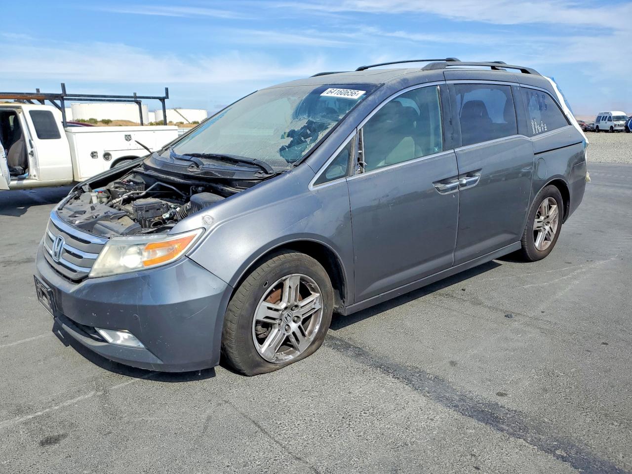 2012 Honda Odyssey Touring, VIN 5FNRL5H95CB021625 — Vandalism