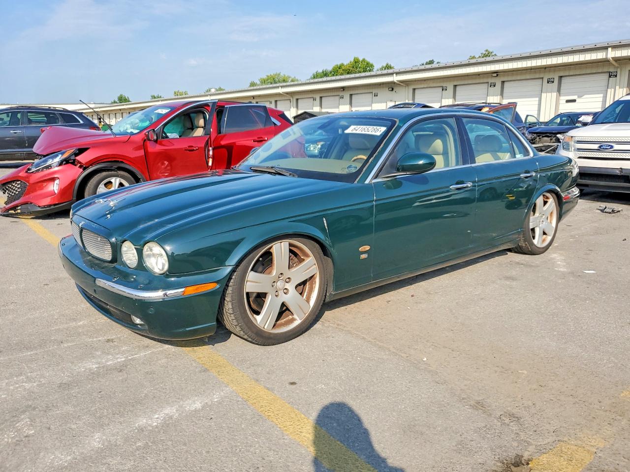 2006 Jaguar XJ, VIN SAJWA73C26TH04301 — Мелкие вмятины и царапины