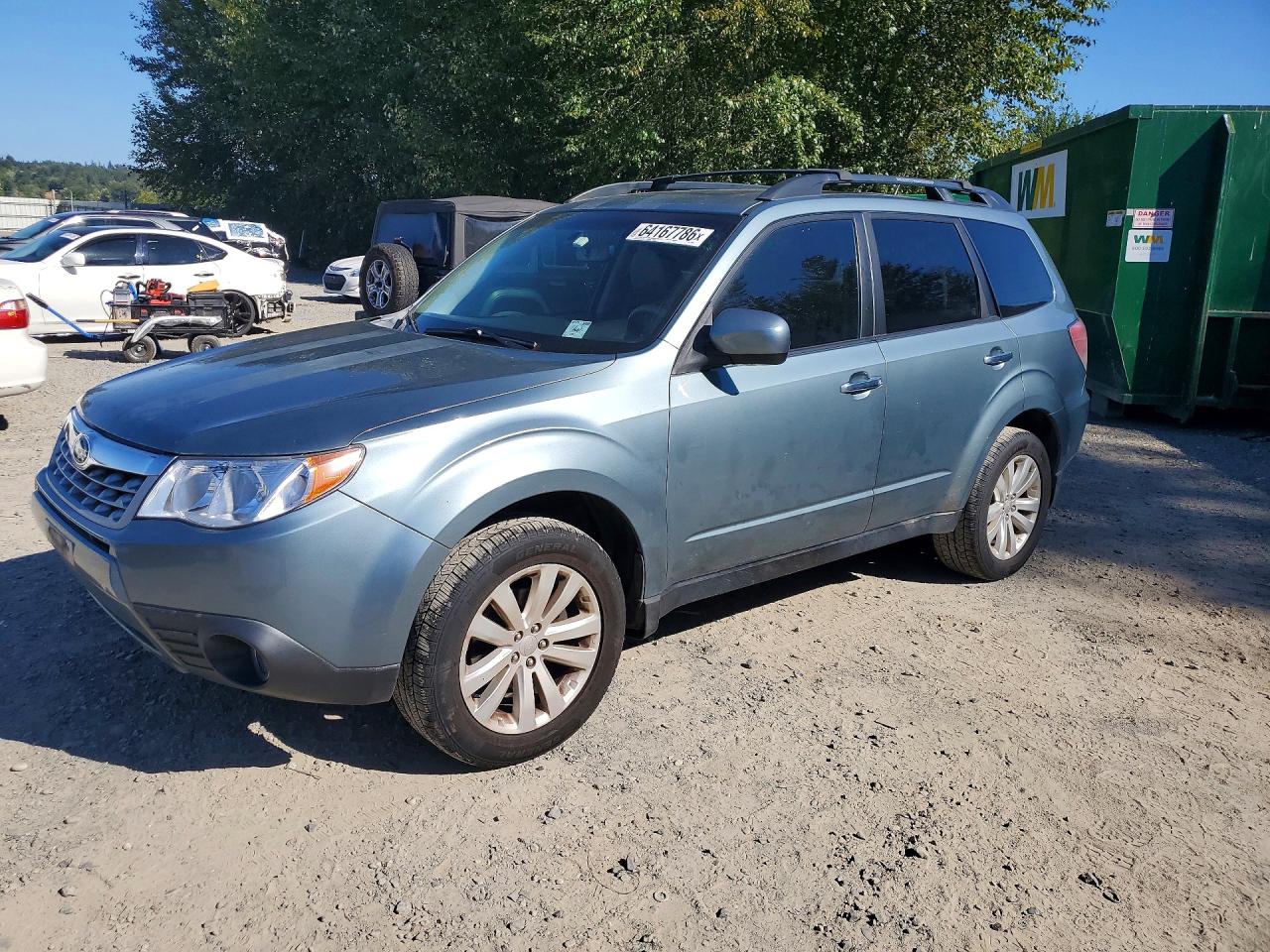 2011 Subaru Forester X Limited, VIN JF2SHAEC9BH757012 — Зад