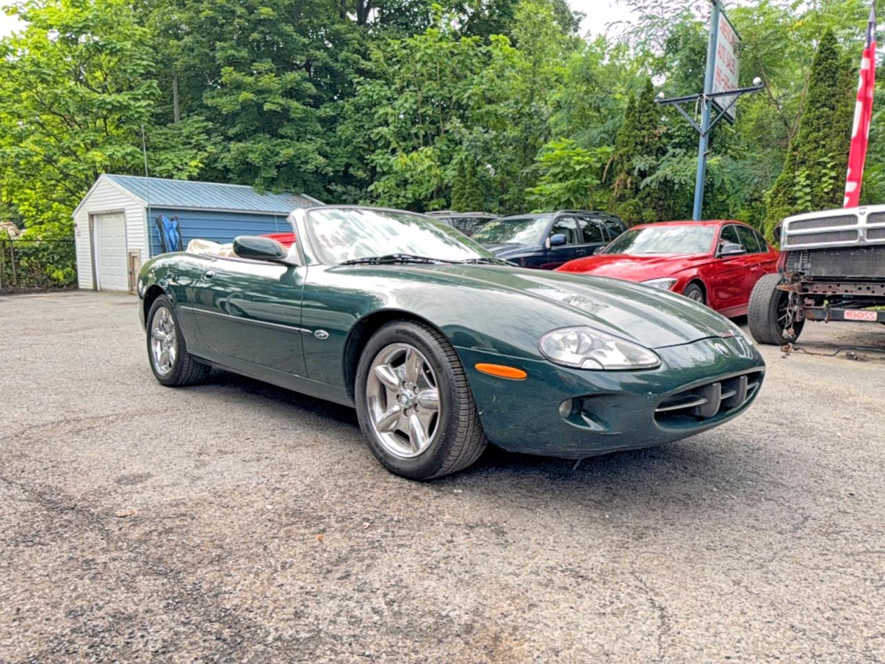 1999 Jaguar XK, VIN SAJGX2049XC038524 — Мелкие вмятины и царапины