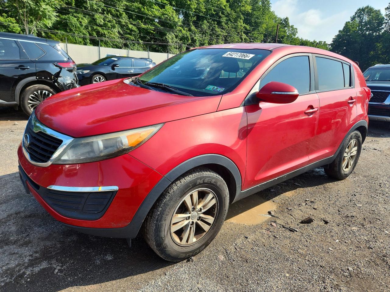 2011 Kia Sportage LX, VIN KNDPB3A28B7059737 — Фото с аукциона 1 of 4