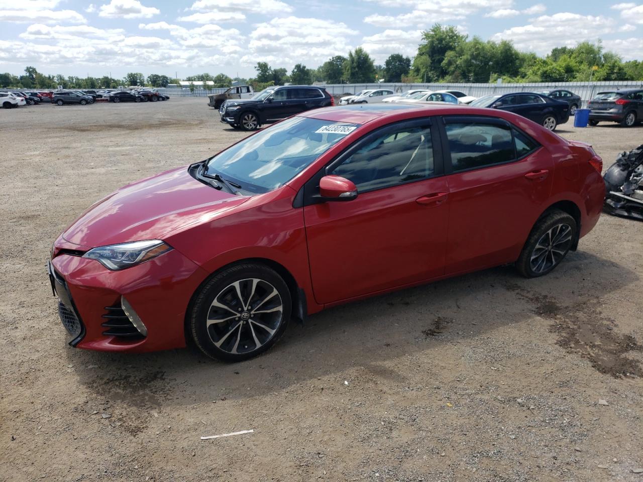2018 Toyota Corolla L, VIN 2T1BURHE5JC124032 — Side