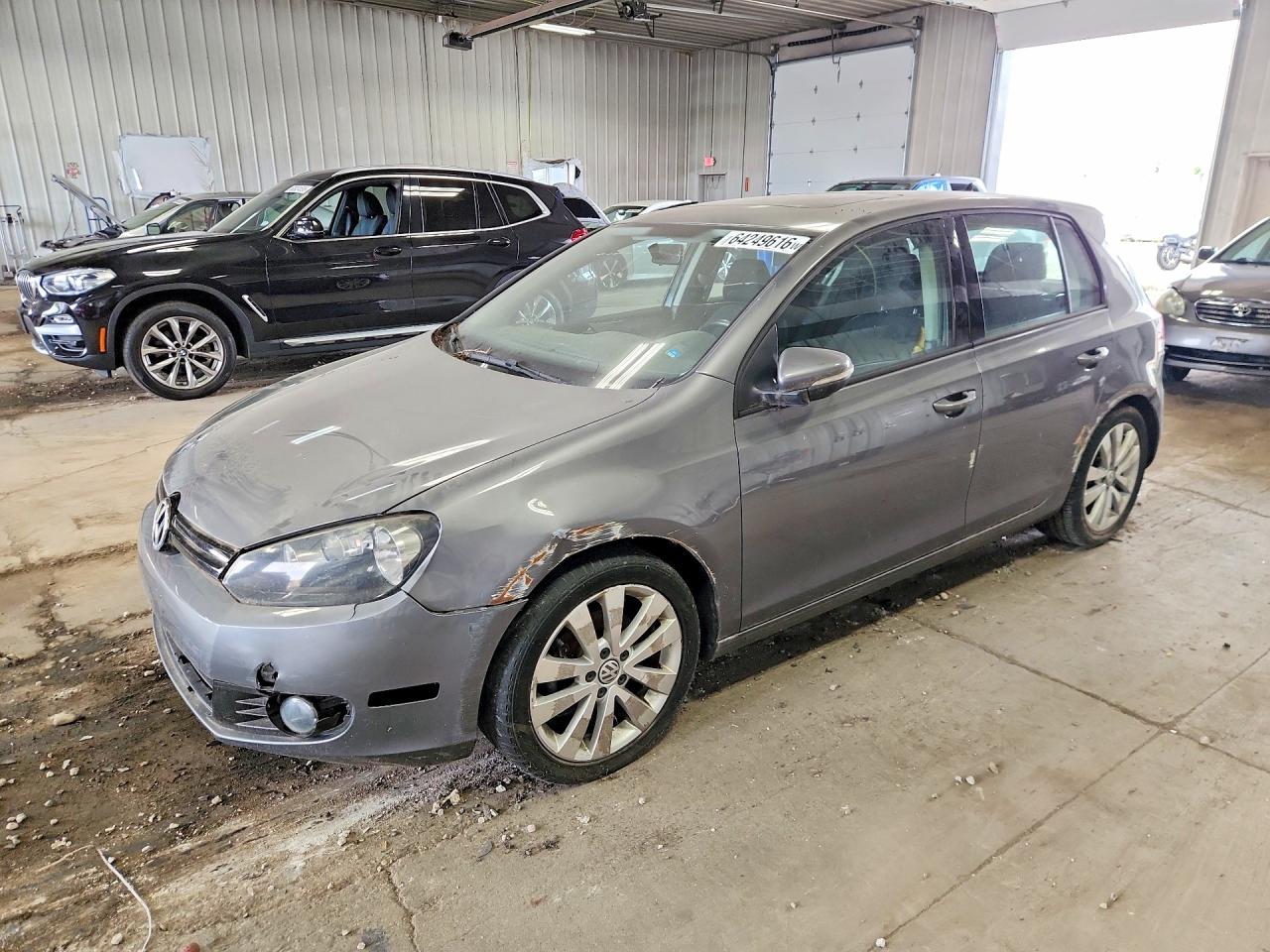 2013 Volkswagen Golf TDI, VIN WVWDM7AJ1DW019777 — Minor dents and scratches