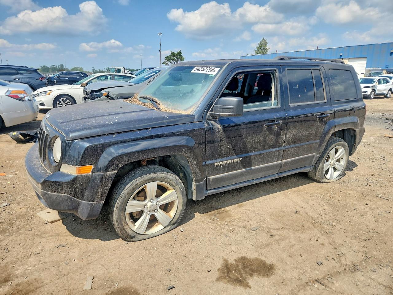 2014 Jeep Patriot Latitude, VIN 1C4NJRFB5ED820896 — Зад