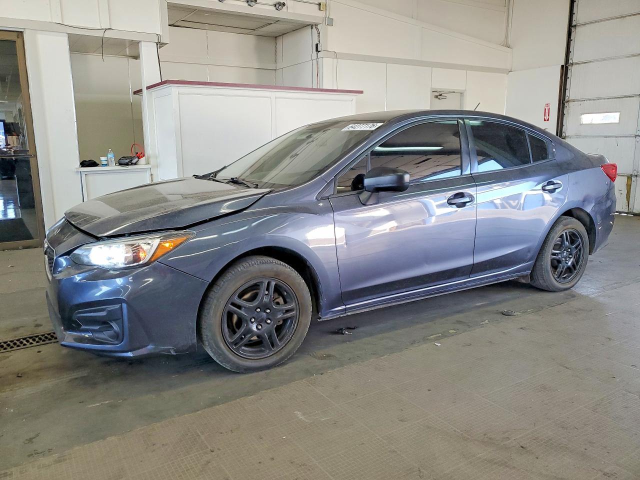 2017 Subaru Impreza, VIN 4S3GKAA65H3613730 — Front end