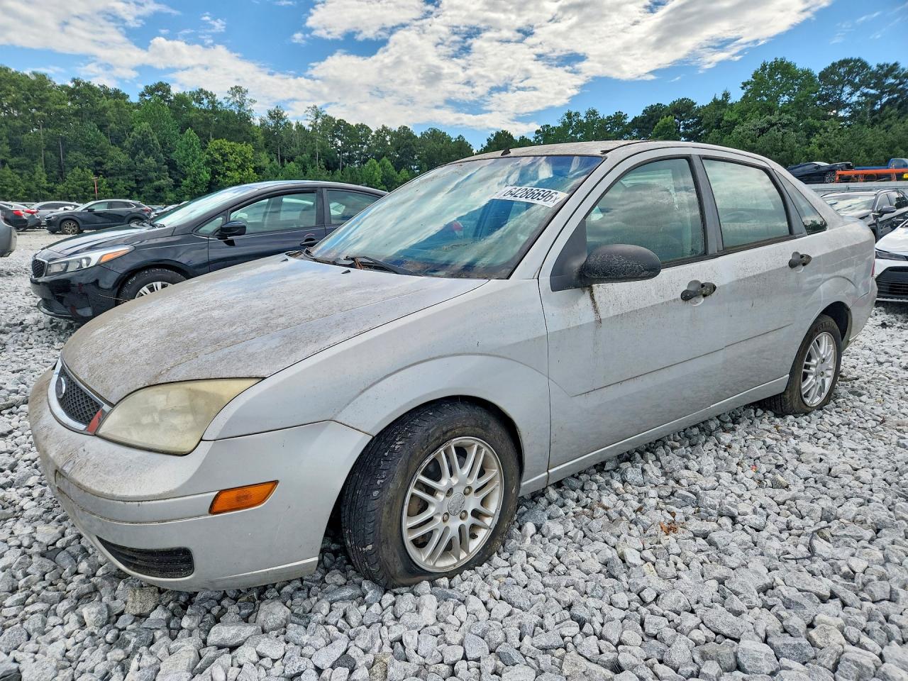 2007 Ford Focus S, VIN 1FAFP34N27W244596 — Мелкие вмятины и царапины