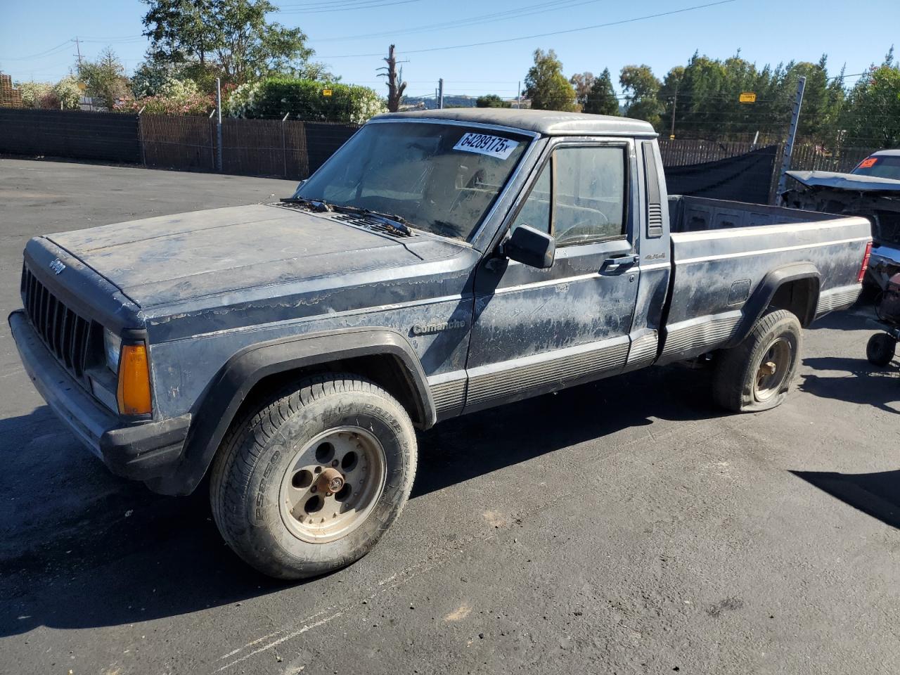 1989 Jeep Comanche, VIN 1J7FJ26L4KL494205 — Бок
