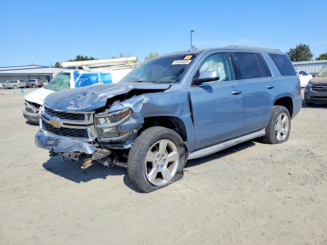 2015 Chevrolet Tahoe LT, VIN 1GNSCBKC7FR672250 — Front end