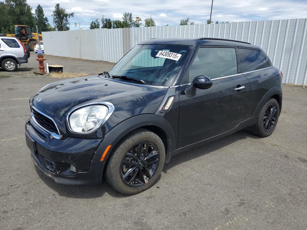2014 MINI Paceman S, VIN WMWSS5C52EWN67125 — Бок