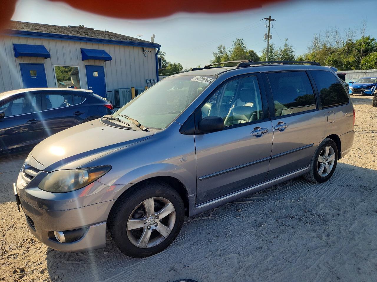 2004 Mazda MPV ES, VIN JM3LW28J740531326 — Side