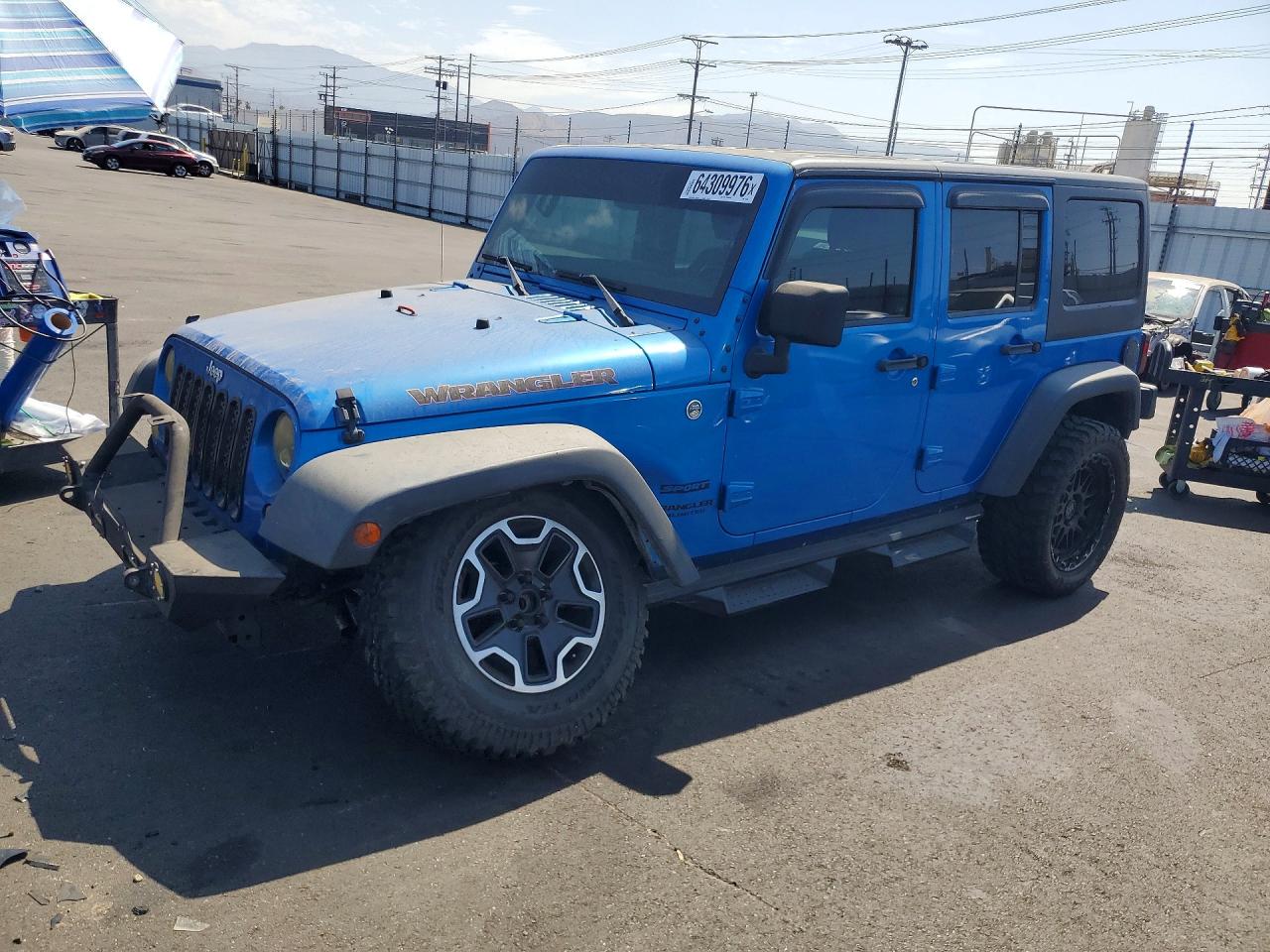 2015 Jeep Wrangler Unlimited Willys Wheeler, VIN 1C4BJWDG9FL570506 — Front end
