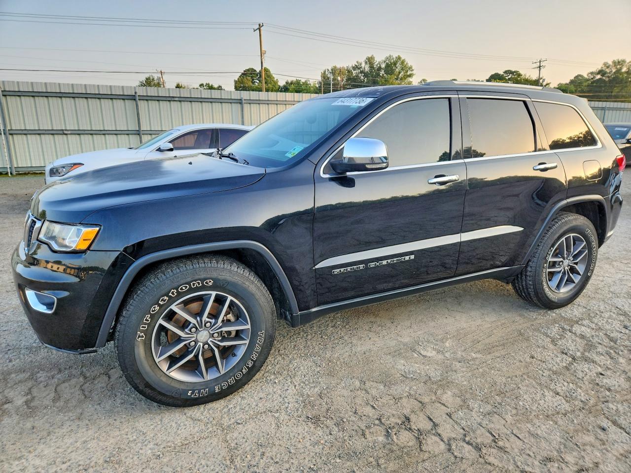 2017 Jeep Grand Cherokee Limited, VIN 1C4RJEBG6HC674823 — Side