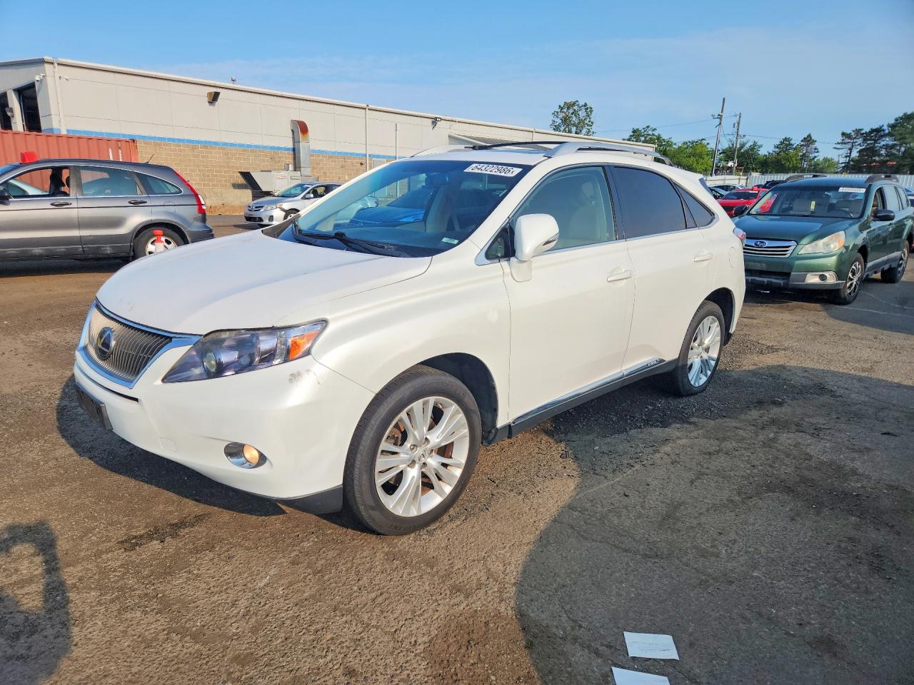 2010 Lexus RX 450h, VIN JTJBC1BA3A2412797 — Minor dents and scratches