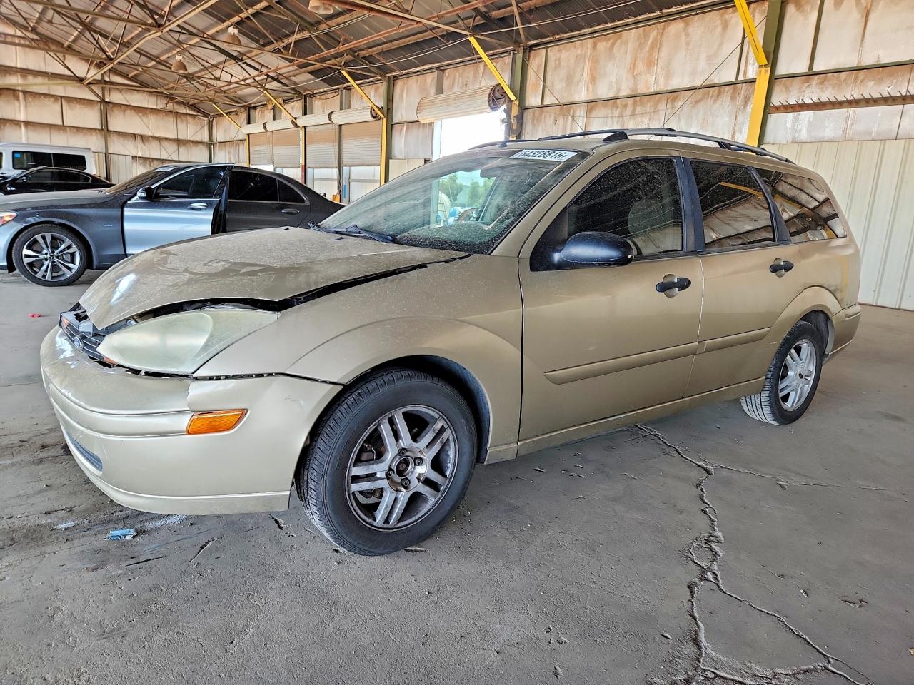 2000 Ford Focus SE, VIN 1FAFP3630YW229639 — Front end