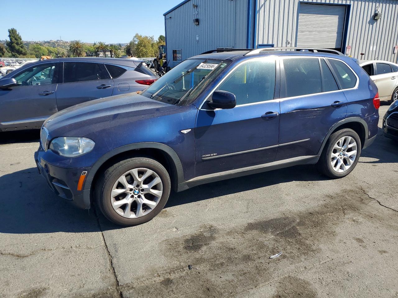 2013 BMW X5 xDrive35i, VIN 5UXZV4C5XD0E13560 — Бок