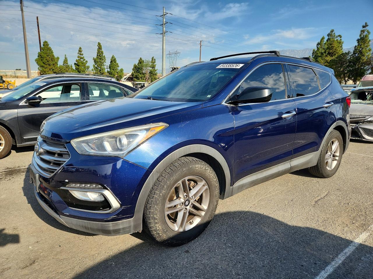 2017 Hyundai Santa Fe 2.4L, VIN 5XYZU3LB0HG494974 — Front end