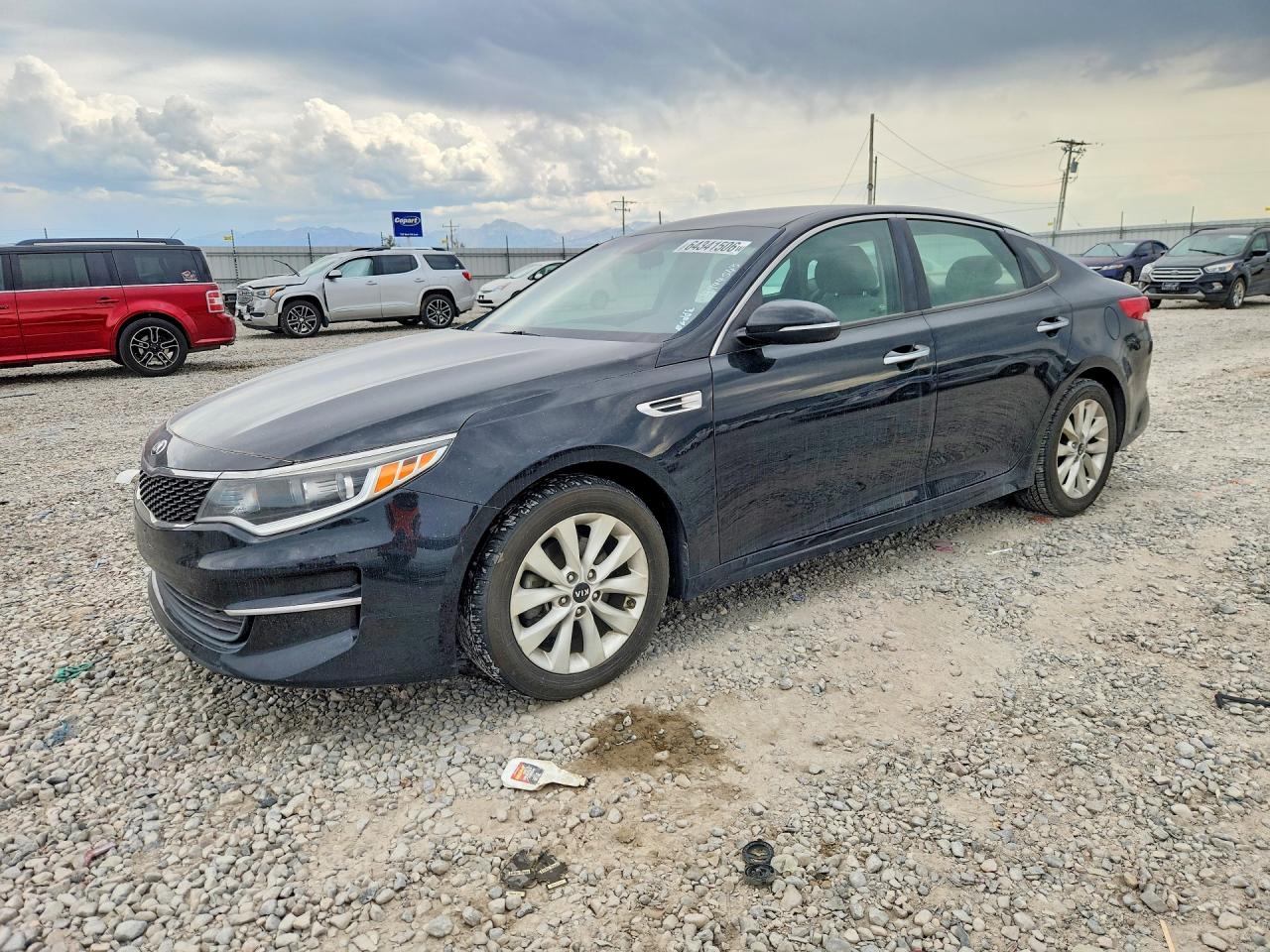 2016 Kia Optima LX, VIN 5XXGT4L31GG007566 — Normal wear