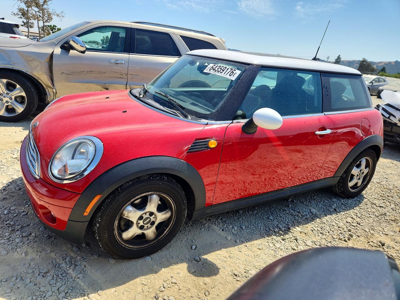 2009 MINI Hardtop, VIN WMWMF335X9TW78420 — Мелкие вмятины и царапины