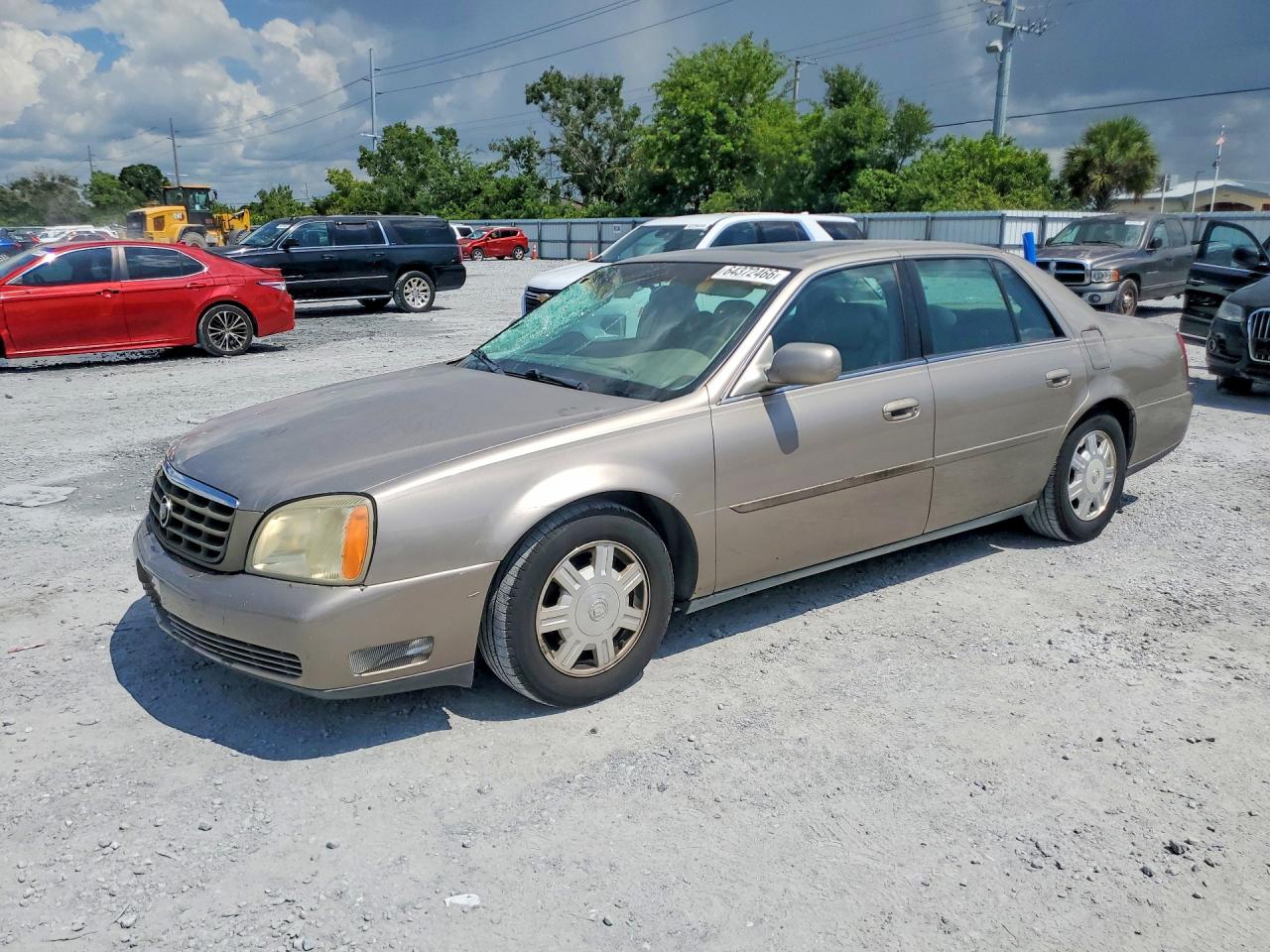 2004 Cadillac DeVille, VIN 1G6KD54Y84U152393 — Minor dents and scratches